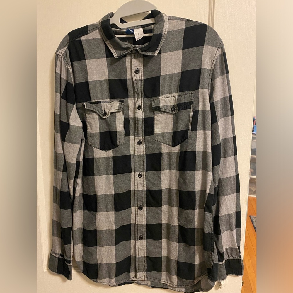 Black and grey checkered H&M collared Flannel shirt in Medium.